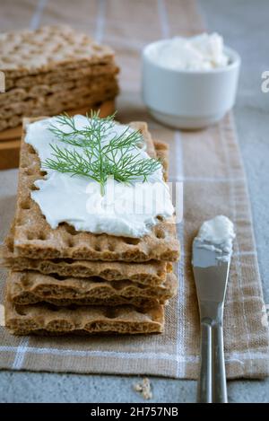 Thin crispy bread made from rye flour. Diet food. Vertical shot. Stock Photo
