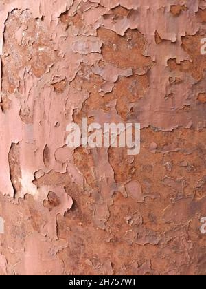 weathered rust crackled and scratched brown painted steel texture background Stock Photo