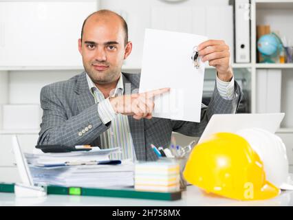 Professional man working with documents Stock Photo