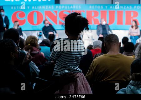 Madrid, Spain. 20th Nov, 2021. A girl seen during a political meeting.Spanish and Brazilian political and union leaders meet in Madrid to discuss the future challenges of left-wing parties and the need to build popular alliances at the international level to combat far-right movements. The forum was held at Casa America in Madrid. (Photo by Diego Radames/SOPA Images/Sipa USA) Credit: Sipa USA/Alamy Live News Stock Photo