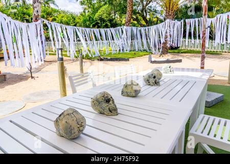 Mauritius Island - 31.10.2021 Decorative skulls on the tables. Halloween decoration in the hotel for Halloween party for children. High quality photo Stock Photo