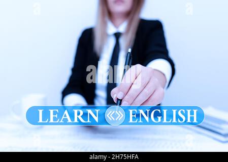 Sign displaying Learn English. Business approach gain acquire knowledge in new language by study Presenting Corporate Business Data, Discussing Stock Photo
