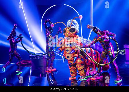 Cologne, Germany. 20th Nov, 2021. The character 'The Caterpillar' is on stage in the Prosieben show 'The Masked Singer'. Credit: Rolf Vennenbernd/dpa/Alamy Live News Stock Photo