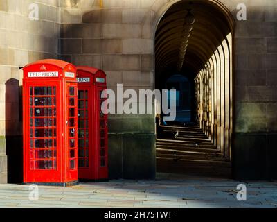 two red telephone boxes in the city Great Britain Stock Photo