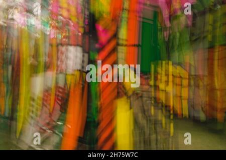 Bursting at the viewer is this zoomed shot of colorful stained glass, creating interest with its texture,. patterns, lines, shapes, & depth. Stock Photo
