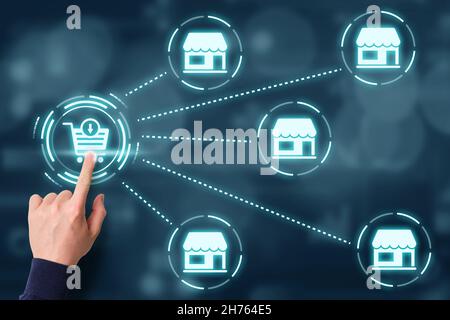Concept add to cart. The person makes purchases in various online stores. The hand presses on the abstract display Stock Photo