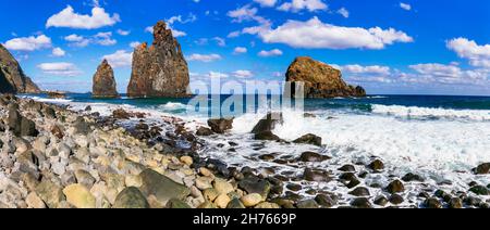 Madeira island nature scenery. Sea landscape in stormy weather, amazing beach Ribeira da janela with huge rock formation in the northern coast Stock Photo