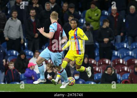 Burnley, UK. 20th Nov, 2021. Michael Olise of Crystal Palace looks to go past Ben Mee of Burnley. Premier League match, Burnley v Crystal Palace at Turf Moor in Burnley, Lancs on Saturday 20th November 2021. this image may only be used for Editorial purposes. Editorial use only, license required for commercial use. No use in betting, games or a single club/league/player publications. pic by Chris Stading/Andrew Orchard sports photography/Alamy Live news Credit: Andrew Orchard sports photography/Alamy Live News Stock Photo