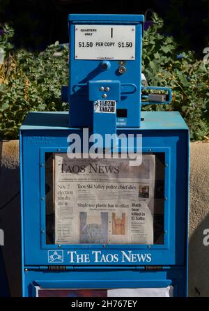 A coin operated vending machine for the  local newspaper in Taos, New Mexico. Stock Photo