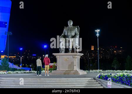 Sculpture of first President of Kazakhstan Nursultan Nazarbaev sitting in the chair, bronze, July 2021. The elbasy, ruler of Kazakhstan. Nur-Sultan Stock Photo