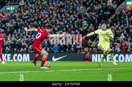 Liverpool. 21st Nov, 2021. Liverpool's Diogo Jota (L) scores the second goal during the English Premier League match between Liverpool and Arsenal in Liverpool, Britain, on Nov. 20, 2021. Liverpool won 4-0. Credit: Xinhua/Alamy Live News Stock Photo