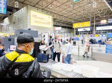 Security luggage baggage bags check at the entrance to Almaty airport terminal, Kazakhstan Stock Photo