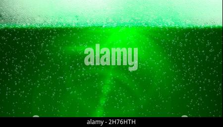 St. Patrick's Day Green Beer background with lens flare. For festive pub party event. 3d render, 3D illustration Stock Photo