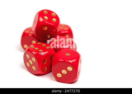 Red wooden dice against white background Stock Photo