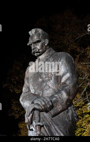 Statue of Marshal Józef Piłsudski by night at Belweder Palace in city of Warsaw in Poland. Stock Photo