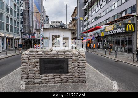 City of Berlin, Germany, Checkpoint Charlie, old Berlin Wall crossing point between East and West Berlin and McDonald restaurant Stock Photo
