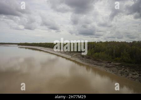 Cloudy sky over the Yellow River in Kakadu National Park during the rainy season, Northern Territory, Australia. Stock Photo