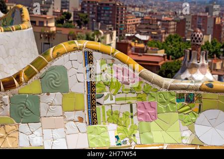 Ceramic bench and building in the Park Guell designed by the famous architect Antoni Gaudi (1852-1926). UNESCO, World Heritage Site Stock Photo