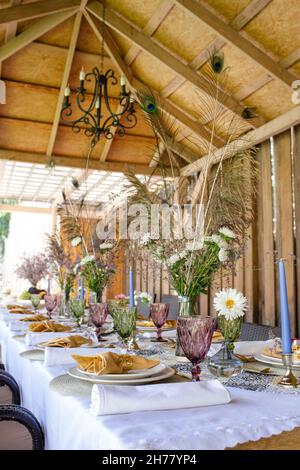 stylish cutlery for festive table setting. festive decor. Stock Photo