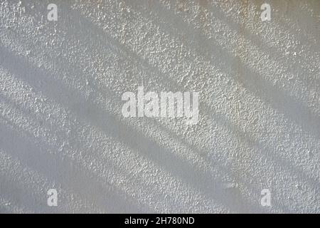 Sunlight light with abstract diagonal shadows on white wall texture background. Geometric shadows outdoors Stock Photo