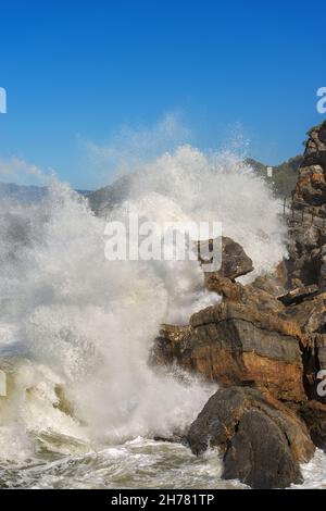 Waves splashing on the Cliff in the small village of Tellaro, in the Gulf of La Spezia, Liguria, Italy, Europe Stock Photo