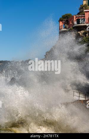 Waves splashing on the Cliff in the small village of Tellaro, in the Gulf of La Spezia, Liguria, Italy, Europe Stock Photo