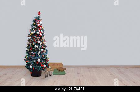 christmas tree on hardwood floor Stock Photo