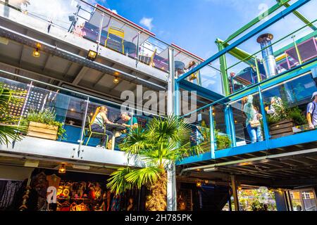 Interior of Buck Street Market made out of shipping containers, a new artisanal and food market in Camden, London, UK Stock Photo