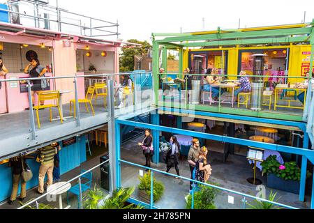 Interior of Buck Street Market made out of shipping containers, a new artisanal and food market in Camden, London, UK Stock Photo