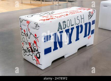 A plywood and foam imitation of an NYPD police barrier that viewers are invited to write on. At the queens Museum in Flushing Meadows Corona Park, NYC Stock Photo