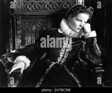 KATHARINE HEPBURN as Mary Queen of Scots sitting on Throne in MARY OF SCOTLAND 1936 director JOHN FORD play Maxwell Anderson screenplay Dudley Nichols costumes Walter Plunkett RKO Radio Pictures Stock Photo