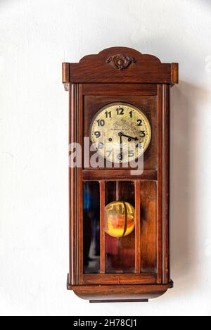 Antique pendulum wall clock, Casa Consistorial, Holguin, Cuba Stock Photo