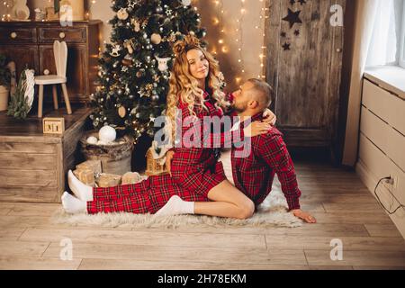 Married couple in love on Christmas eve Stock Photo