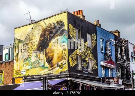 Murals and decorated shop fronts at the crossing of Camden High Street ...