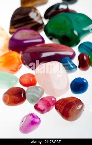 Assortment of semiprecious gemstones on white Stock Photo
