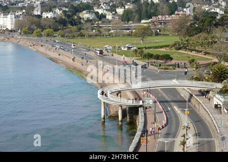 Spiral footbridge across the seafront road at Torquay, South Devon. Stock Photo