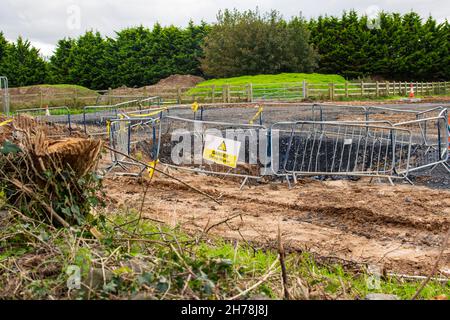 Excavations on the street, assembly of new media under the earth on a new construction site, Limerick bypass. Stock Photo