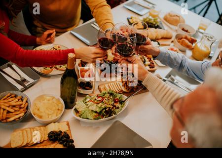 Young father having breakfast with his son and daughter at home, closeup on the food Stock Photo