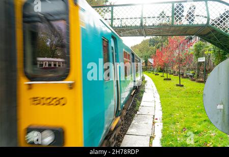 A Train arriving at Betws-Y-Coed train station, in County Conwy, North Wales. Image taken in November 2021. Stock Photo