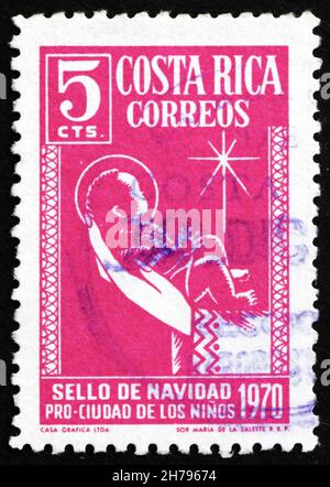 COSTA RICA - CIRCA 1970: a stamp printed in Costa Rica shows Christ Child and Star, circa 1970 Stock Photo