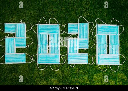 2020 Year Composed of Simple Medical Masks Stock Photo