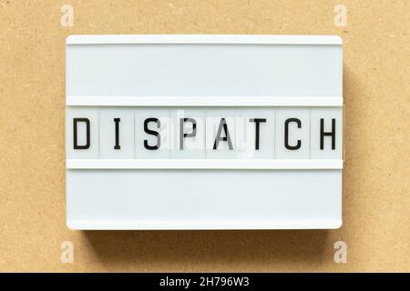 Lightbox with word dispatch on wood background Stock Photo