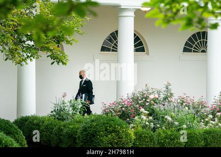 WASHINGTON DC, USA - 18 August 2021 - US President Joe Biden walks along the Colonnade, Wednesday, August 18, 2021, on his way to the Oval Office of t Stock Photo