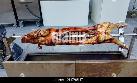 Suckling pig on a rotating spin.  Stock Photo