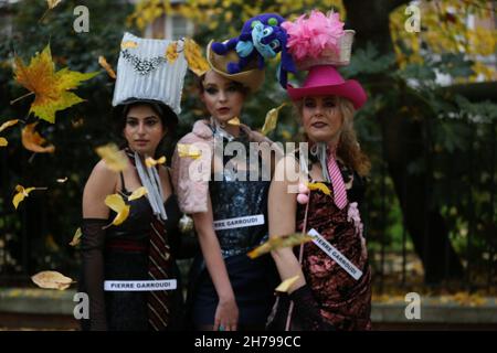 Models showcase Pierre Garroudi's collection during the designer's flash mob fashion show in London, UK