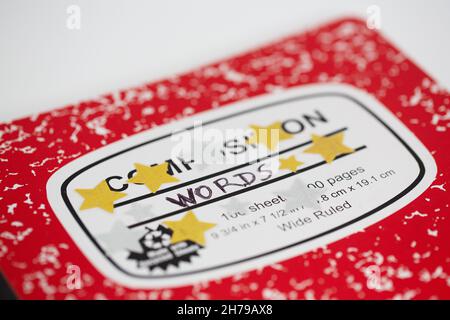 A composition notebook covered in star stickers, and with the word "words" written on front cover. Stock Photo
