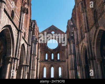 Chiusdino, Italy - August 14 2021: Abbazia San Galgano Abbey, the Ruin of a Gothic Monastery Interior Stock Photo