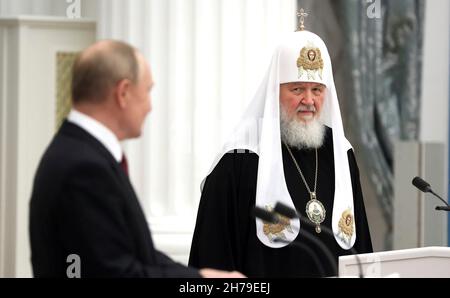 President Vladimir Putin presenting the Order of Honor to popular ...