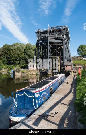 Canal boat waiting for lift to Trent and Mersey Canal at high level Anderton Boat lift Northwich Cheshire 2021