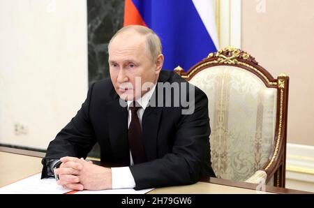 Moscow, Russia. 19 November, 2021. Russian President Vladimir Putin chairs a meeting with members of the Security Council via video conference at the Kremlin, November 19, 2021 in Moscow, Russia.  Credit: Mikhail Metzel/Kremlin Pool/Alamy Live News Stock Photo